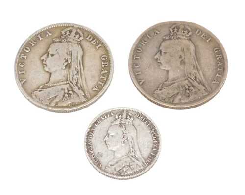 Coins. A Victorian half crown, 1891 shilling, and a further 1890 half crown. (3)