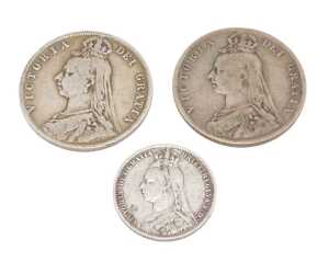 Coins. A Victorian half crown, 1891 shilling, and a further 1890 half crown. (3)