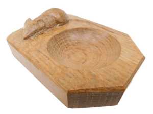 A Robert Thompson of Kilburn Mouseman oak ashtray, of shaped rectangular form, with canted ends...