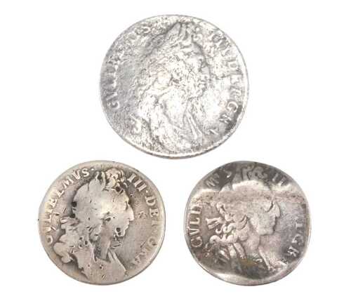 Various coins. A William III shilling 1696, and two six pences, probably 1697 and 1694. (3)