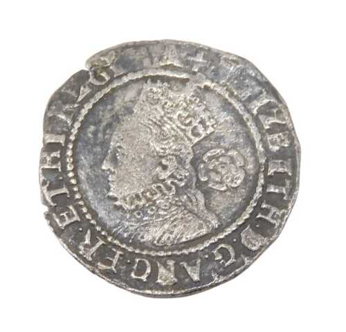 Coins. An Elizabeth I threepence, probably 1578.