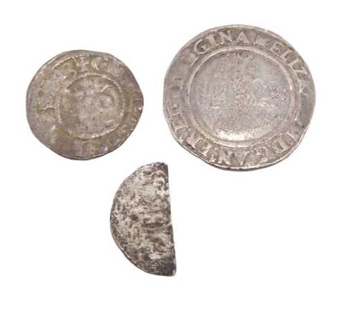 Coins. An Elizabeth I silver six pence 1585, King Stephen 1135 -54 half or part coin, an Edward...