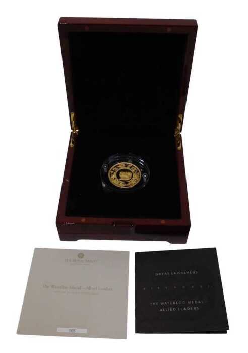 A Royal Mint Great Engravers gold waterloo medal, &pound;100 denomination, in capsule, box and outer...