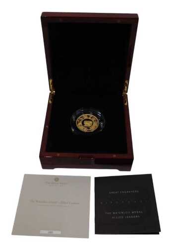 A Royal Mint Great Engravers gold waterloo medal, &pound;100 denomination, in capsule, box and outer...