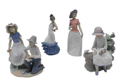 Various Nao figures, to include A Tender Moment, model 0448, 21cm high, and three others. (4)
