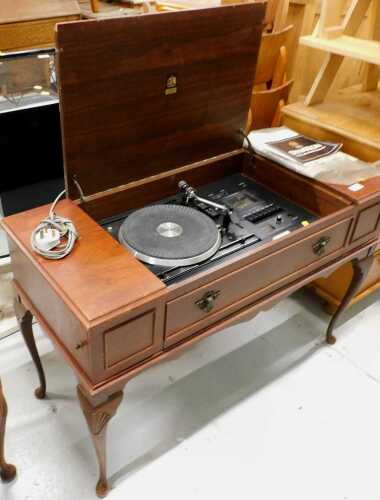 A walnut cased Dynatron radiogram, with P200 turntable, in fitted case.