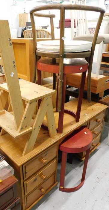 A set of Metamorphic pine library steps, a bentwood chair, two side tables, and a pine desk.