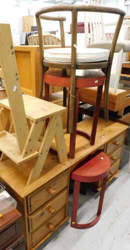 A set of Metamorphic pine library steps, a bentwood chair, two side tables, and a pine desk.
