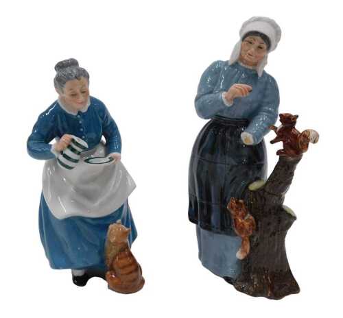 A Royal Doulton figure, Good Friends, and another The Favourite HN2249, 19cm high. (2, 1 AF)