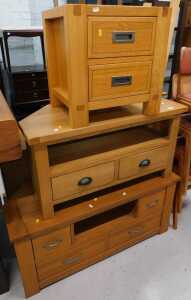 A light oak two drawer bedside cabinet, TV stand, and another.