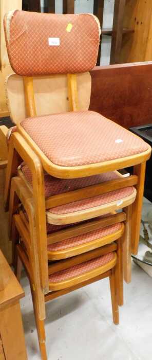 Various stacking chairs, with overstuffed backs and seats, with flock stuffing.
