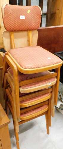 Various stacking chairs, with overstuffed backs and seats, with flock stuffing.