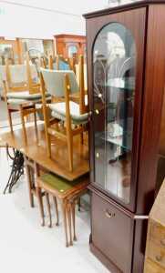 A teak gate leg table and four chairs, each with overstuffed seats, a nest of tables, and a...