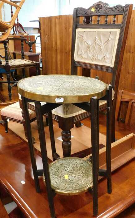 An Edwardian overstuffed chair, brass two sectional display side table, and an overstuffed stool....