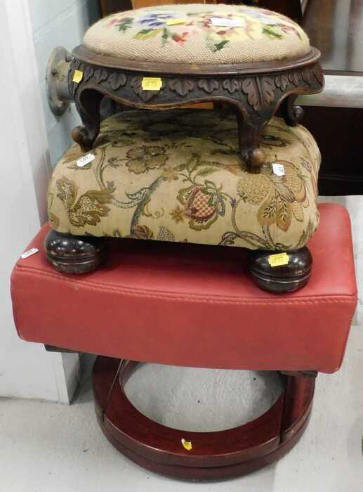 An early 20thC heavily carved oak hassock, of circular form, overstuffed footstool, and a later...