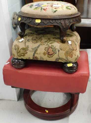 An early 20thC heavily carved oak hassock, of circular form, overstuffed footstool, and a later...