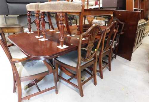 A Regency style twin pillar dining room suite, comprising D end table with leaf, on two pillars...