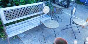 A slatted garden bench, with metal lattice back, two further patio chairs and table. (a quantity)