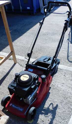 A Mountfield rotary lawn mower, with grass box.