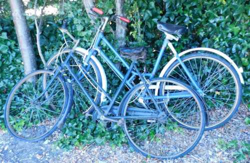 Two vintage bicycles.