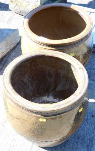 Two Oriental design pottery garden planters of large proportion. (2)