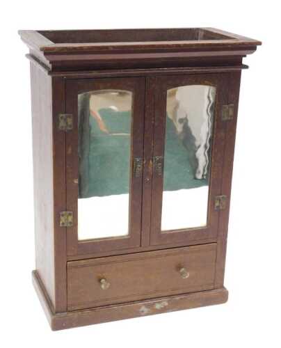 An Edwardian oak stained beech apprentice double door wardrobe, with fixed moulded cornice,...