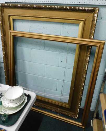 Ornate gilt picture frame, 148cm x 123cm, together with a second gilt picture frame, 121cm x 118cm.