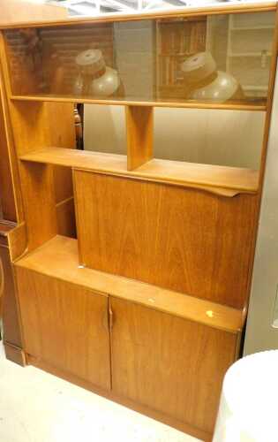 A teak open bookcase.