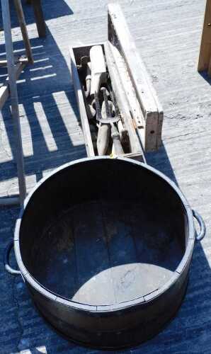 A late 19thC coopered oak barrel, of circular form, with fixed iron handles, 53cm wide, and a...