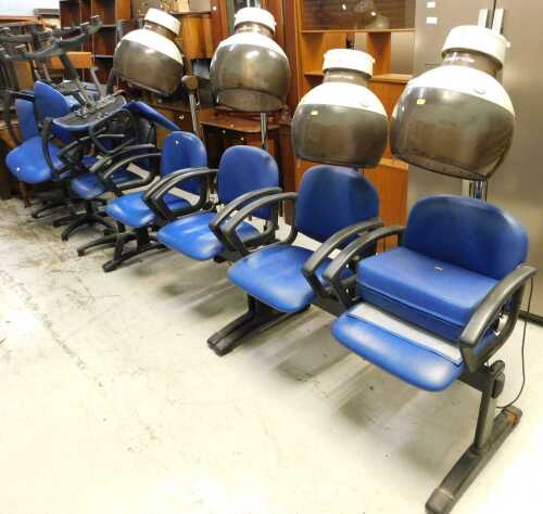 Eight blue office style chairs and various vintage floor standing hairdryers. (AF)