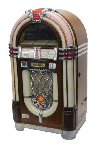 A Wurlitzer MB20/16 juke box, numbered 29105317, in a domed veneered case with Art Deco car...