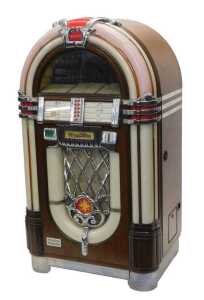 A Wurlitzer MB20/16 juke box, numbered 29105317, in a domed veneered case with Art Deco car...
