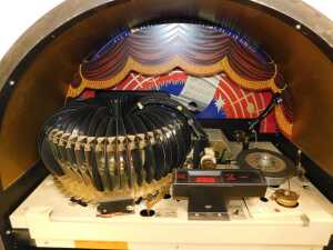 A Wurlitzer MB20/16 juke box, numbered 29105317, in a domed veneered case with Art Deco car... - 7