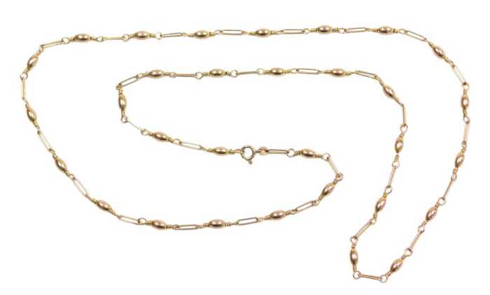 A 9ct gold fancy link neck chain, with ball and bar design, 80cm long, 16.9g.
