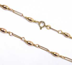 A 9ct gold fancy link neck chain, with ball and bar design, 80cm long, 16.9g. - 2