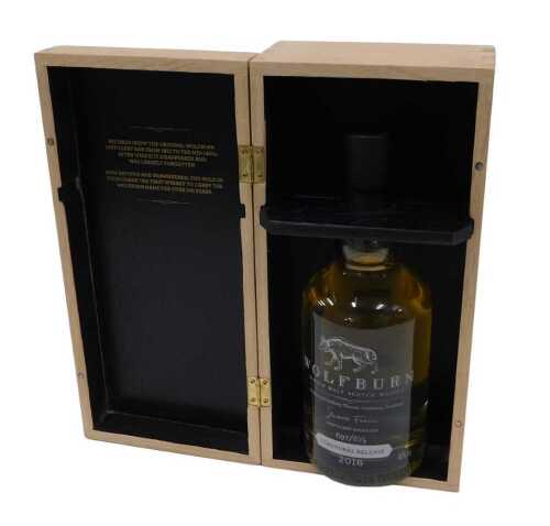 A bottle of Wolfburn single malt whisky, inaugural release 2016, in wooden case, 31cm high, with...