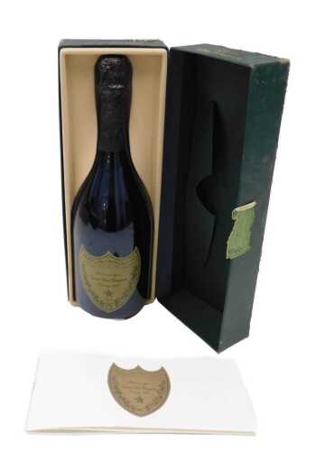 A bottle of Moet & Chandon Dom Perignon 1993 vintage Champagne, 750ml, in outer case. (the case AF)