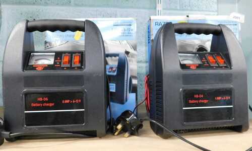 A Raze car battery charger, 6AMP or 12 volt, boxed, together with another.