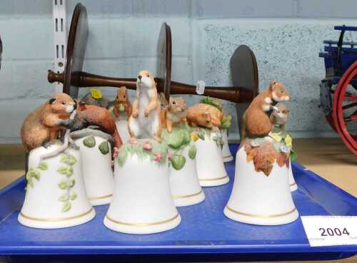 A collection of porcelain bells, animal handles, to include otter, fox, squirrel, deer, etc.,...