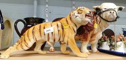 A large ceramic Staffordshire Nelson bull, 25cm high, together with ceramic Ronzan tiger, and...