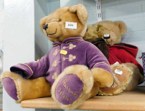 A Harrod's 2000 Christmas teddy bear, in purple Oriental style jacket, a 2003 Harrod's Christmas...