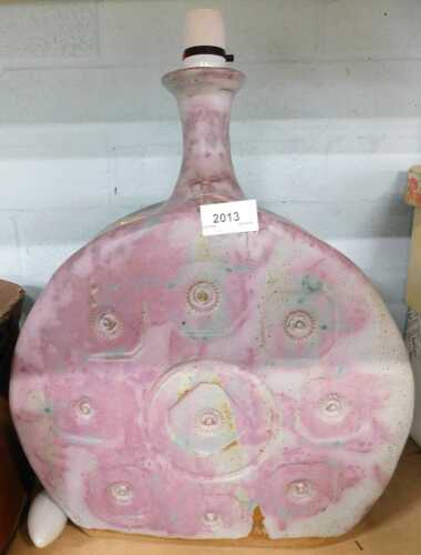 A 1970s lamp base, in the Tremaen Studio style, of shaped form with bulb fitting, 56cm high.