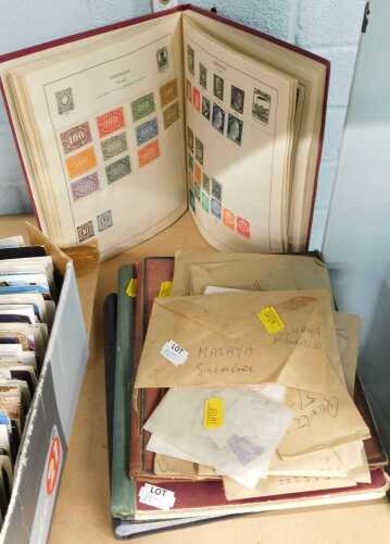 A collection of British and world stamps. (4 albums and loose)
