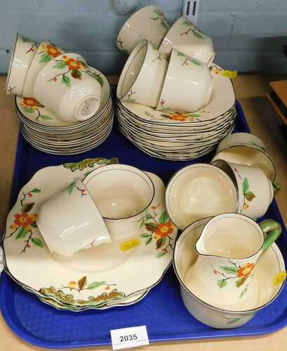A TF&S Limited Blossom part tea set, including cups, saucers, plates, jug, etc.