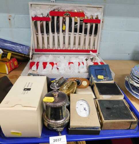 Various Ronson and other lighters, table lighters, Ronson, Queen Anne, etc., and a part canteen...