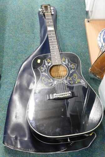 An Eros Korean acoustic guitar, in outer case.