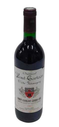 A bottle of Chateau Haut Carteau Cote Daugay wine 1986.