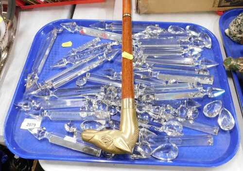 A brass handled walking stick, in the shape of a horse's head, tapered wooden shaft, brass...