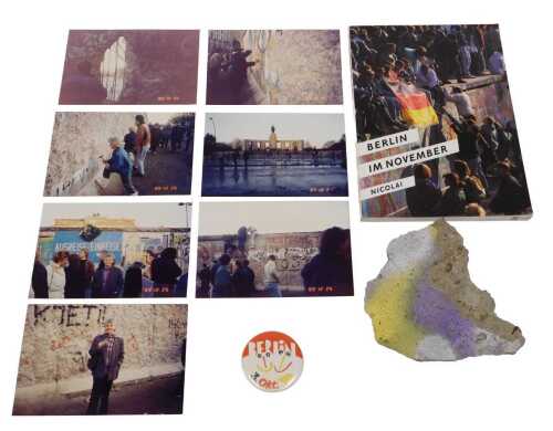 A section of the Berlin Wall, to include provenance photograph of figure stood infront of...