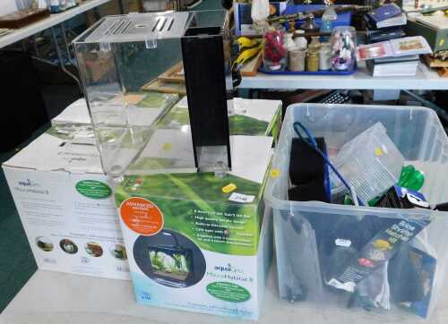 An Aquagro Micro Habitat 8 fish tank, together with three other Micro Habitat fish tanks,...